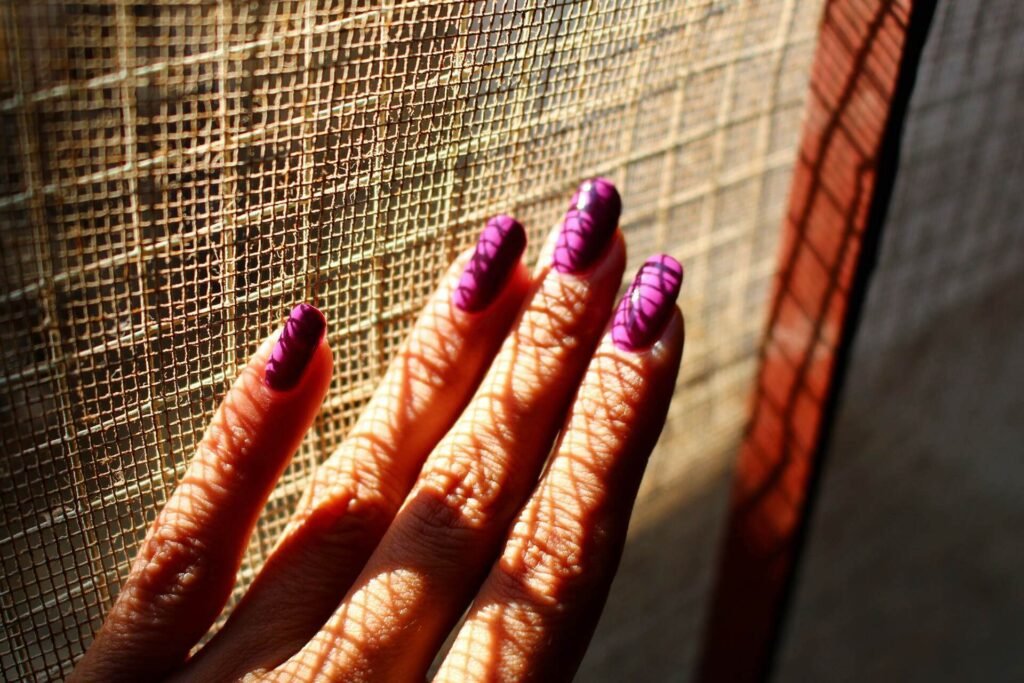 1920 closeup of woman s hand with painted nails in sunlight 1