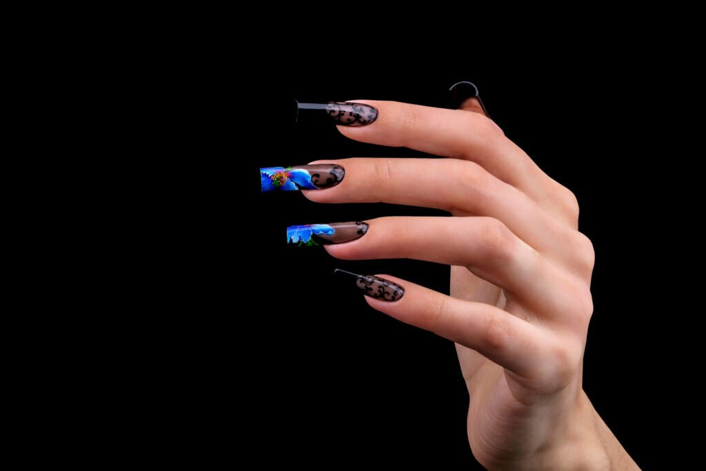 1920 hand with a beautiful manicure on a black background nail design extended nails 1