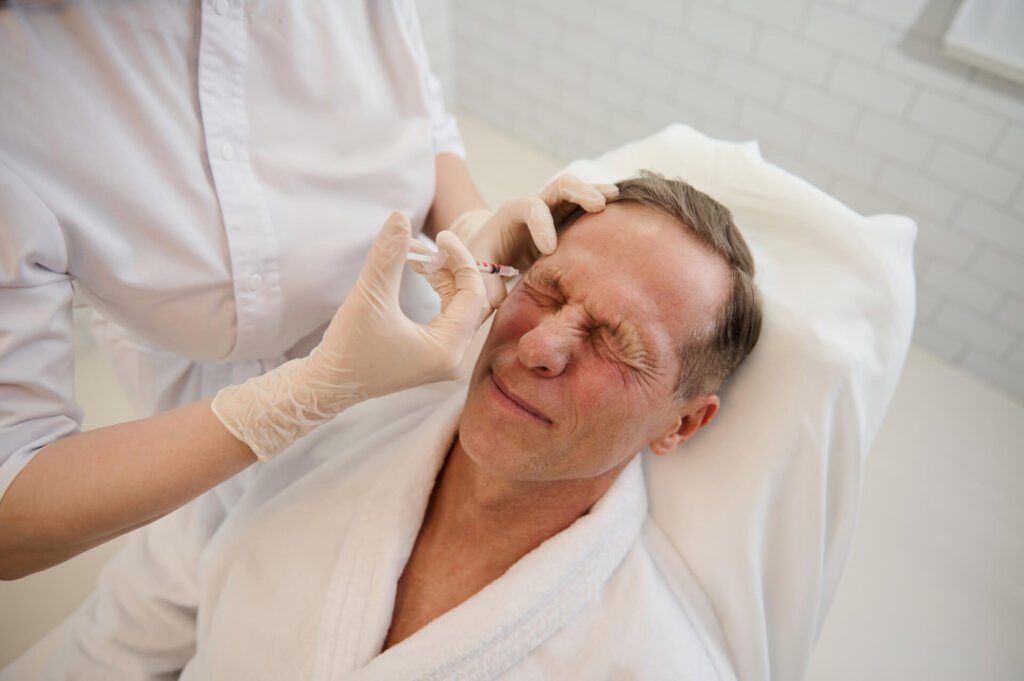 A Man receiving Botox injection in clinic