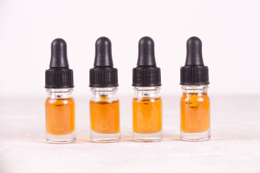 Vials of CBD oil, cannabis live resin extraction